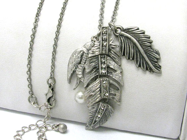 Crystal stud burnish metal feather and bird charm dangle long necklace