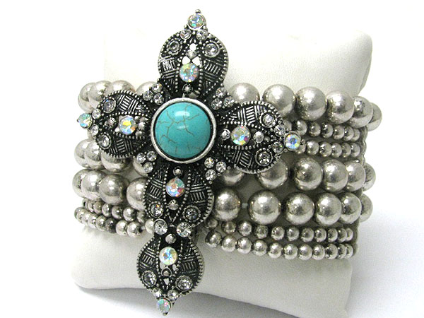 Turquoise stone and crystal deco cross top stretch bracelet