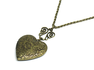 Filigree metal heart locket necklace