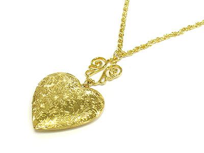 Filigree metal heart locket necklace