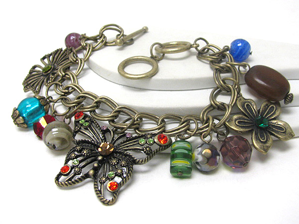 Crystal deco butterfly and glass stone dangle toggle bracelet