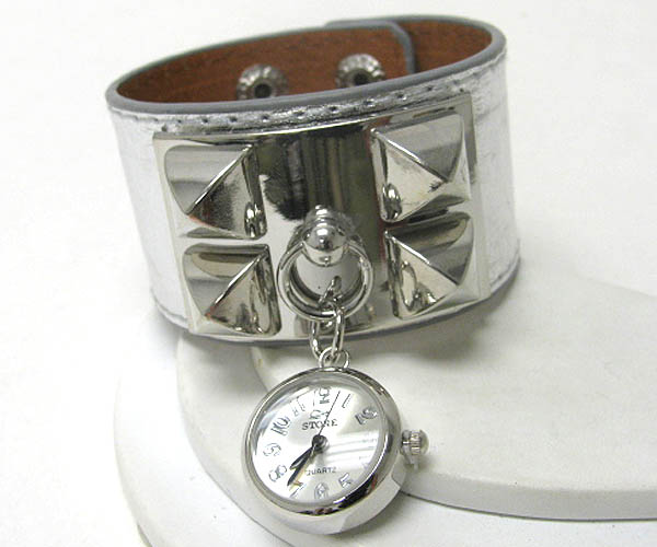 Metal spike and leatherette band watch