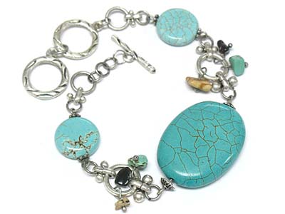 Turquoise stone and multi charms toggle bracelet