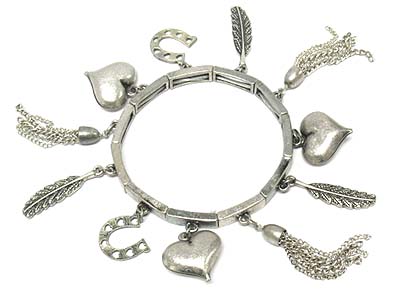 Multi metal heart and horse shoes and feather charms stretch bracelet 