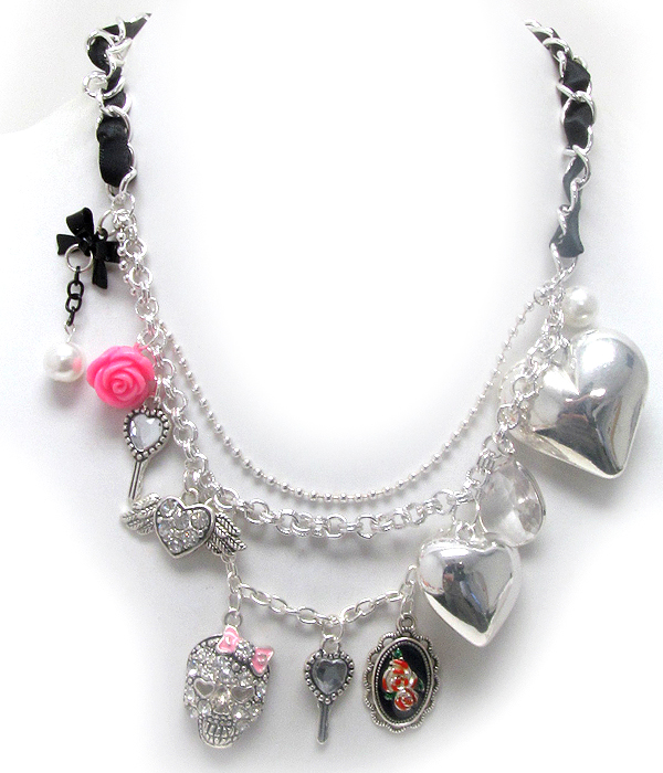 Designer style puff heart and crystal and epoxy skull charm with fabric chain necklace earring set