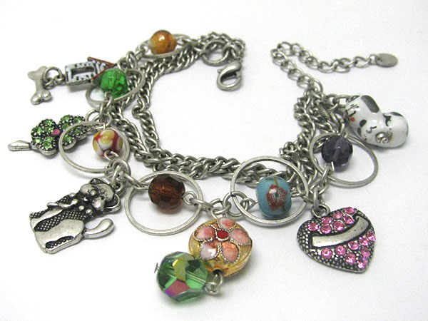 Antique style beads and doggy theme and mixed charm bracelet