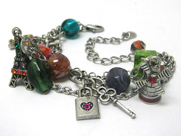 Antique style murano glass and eifel tower and windmill charm bracelet