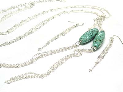 Dual turquoise stone and multi long strand knot style necklace and earring set 