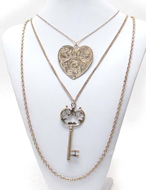 Metal filigree heart and key pendant double strand chain necklace