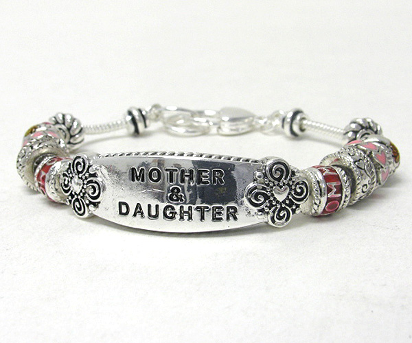 Message plate and multi charm link bracelet