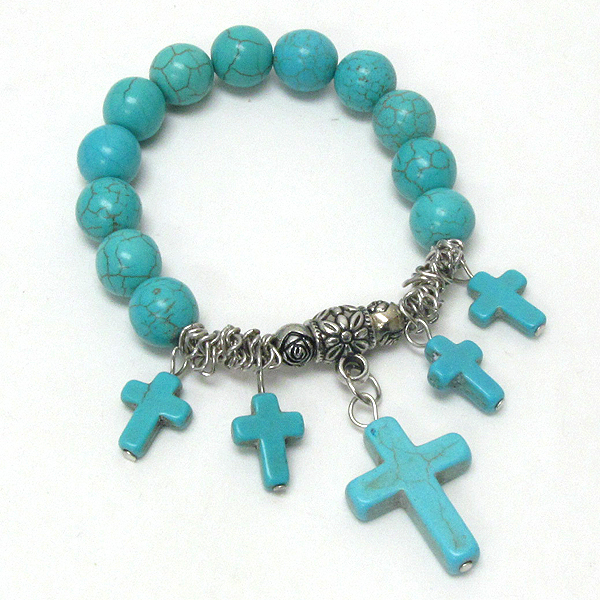 Five turquoise cross charm and ball stretch bracelet