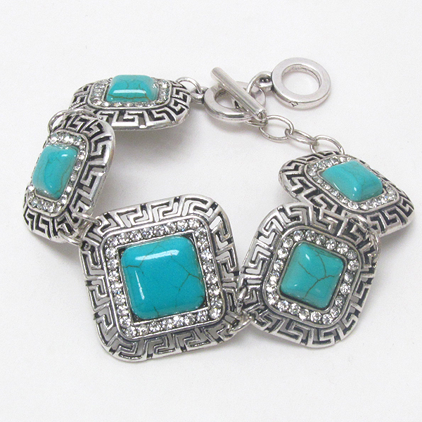 Crystal and turquoise tone stone metla casting toggle bracelet