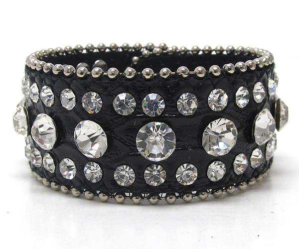 Multi size crystal with small metal ball on leather button bracelet