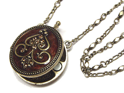 Crystal accent round locket necklace