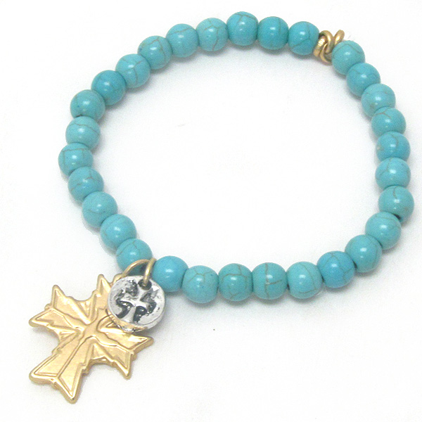 Metal cross charm and turquoise ball stretch bracelet