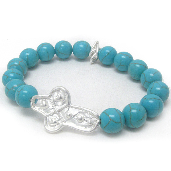 Metal cross and turquoise ball stretch bracelet