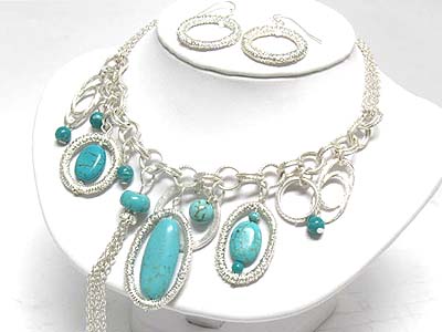 Multi turquoise stone charms and metal ring deco necklace and earring set