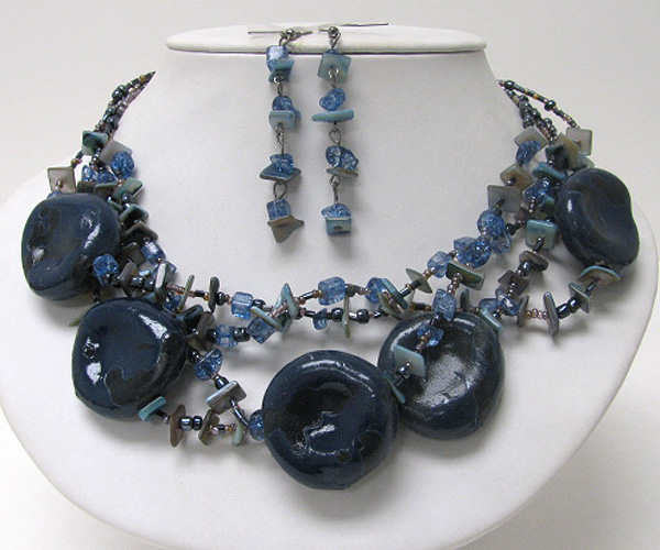 Natural look multi figurine disk and chip stone necklace earring set