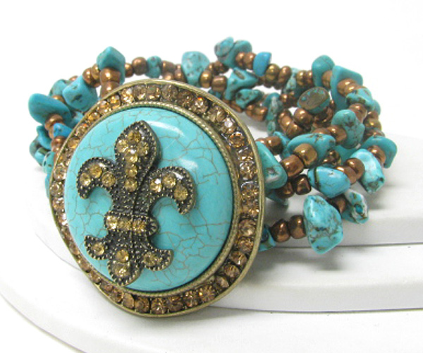 Crystal fluer de lis on turquoise and chip stone stretch bracelet