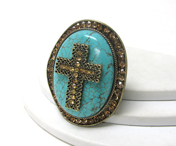 Crystal cross on turquoise stretch ring