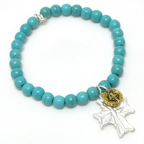 Cross charm and turquoise stretch bracelet