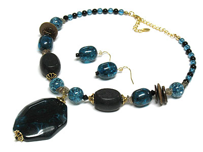 Patina pendant and wood and glass beads necklace and earring set