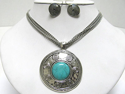 Turquoise stone round metal medallion and multi chain necklace set