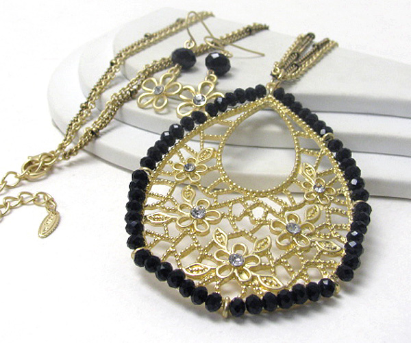 Crystal and metal filigree flower deco pendant necklace earring set