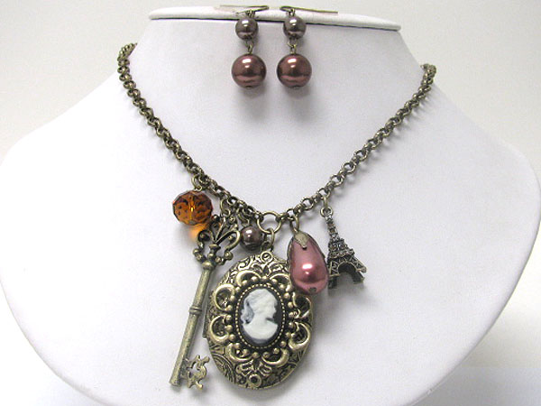 Cameo and  antique metal charm dangle necklace earring set