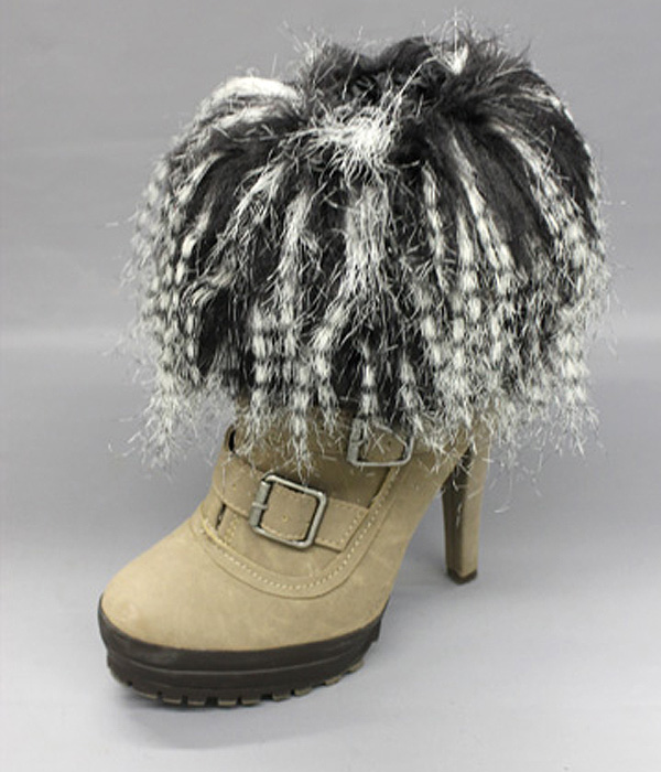 A pair of 100% polyester multi long fur boots topper