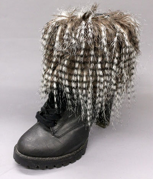 A pair of multi long fur boots topper