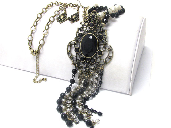 Filigree metal and multi bead drop necklace and earring set