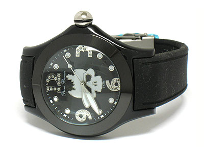 Skull and crystal on face and convex mirror and rubber band watch