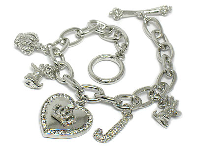 Crystal crown on heart and multi charm toggle bracelet