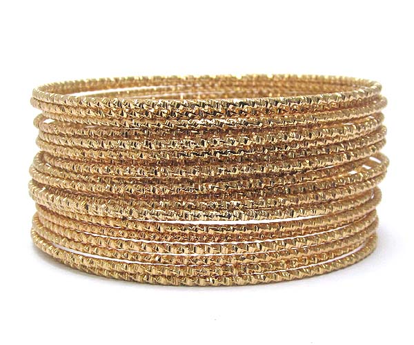 Multi textured metal bracelet